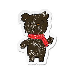 retro distressed sticker of a cartoon cute black bear cub