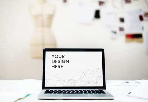 Laptop in a Design Studio Mockup