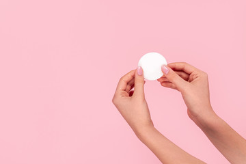 Crop hands touching cotton pad © kegfire