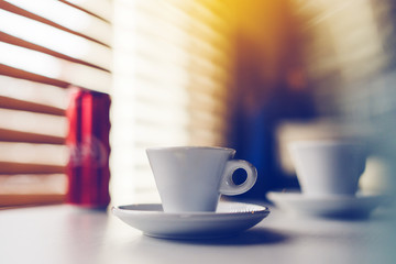Cup of coffee on the table at the cafe shop