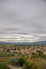 a view of the italian city Arezzo in Tuscany in autumn with a cloudy sky
