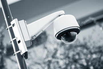 closeup of security camera on urban background