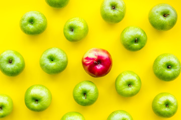 summer fruit pattern with apples on yellow background top view