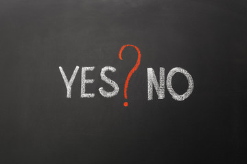 Yes and no with question mark on blackboard