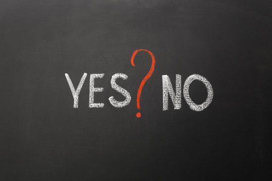 Yes and no with question mark on blackboard
