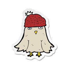 sticker of a cartoon owl wearing hat