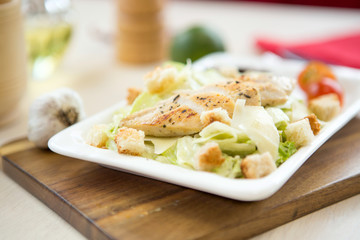 Chicken salad with cherry tomatoes, black olives, kidney bean, sweet corn, cucumber and ice lettuce.