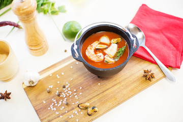 Bowl of Chowder soup with seafood and prawn shrimps.