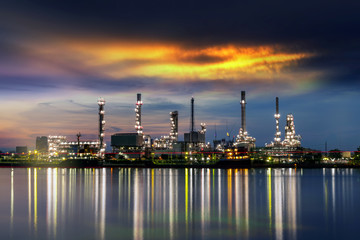 Oil refinery plant in morning sunrise for your work .