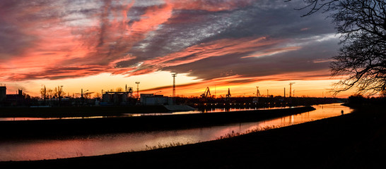 The river bed in the coal unloading zone at the thermal power plant, sunset.