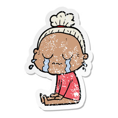 distressed sticker of a cartoon crying old lady
