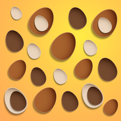 Abstract chocolate easter eggs on yellow background