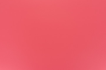 Texture in a bright, pink color illuminated with a delicate light.