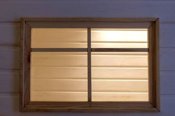 Wooden window in kids play house. Close-up view.