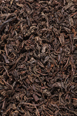 Dried tea leaves. Large leaf black tea.