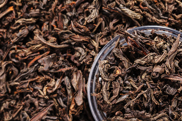 Dried tea leaves. Large leaf black tea.