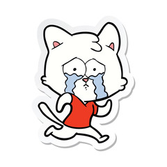 sticker of a crying cartoon cat
