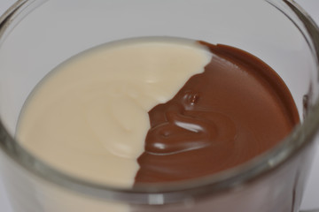 chocolate paste two-color dark and light, in glasswares close up