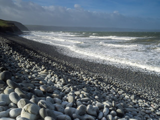 Pebble beach on the coast path between Abbotsham and Westward Ho on the Devon coast of England