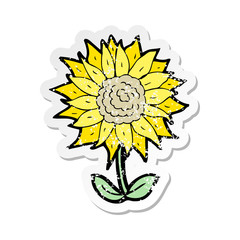 retro distressed sticker of a cartoon flower