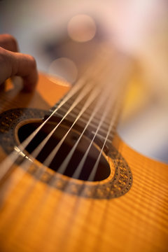 acoustic guitar on black background playing studio recording sound song citter uke ukelele bass instrument musician string rock hand