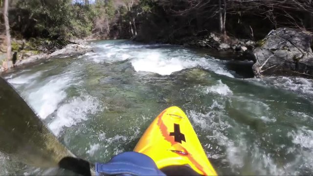 First person view of whitewater kayak on the Applegate River on the border of California and Oregon