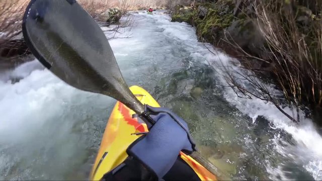 First person view of whitewater kayak on the Applegate River on the border of California and Oregon