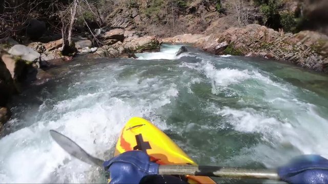 First person view of whitewater kayak on the Applegate River on the border of California and Oregon