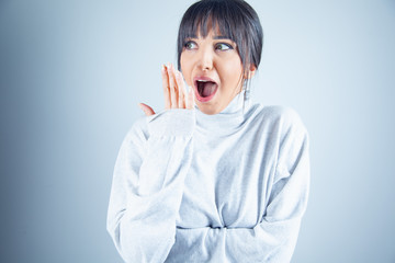 yawn young woman hand in face
