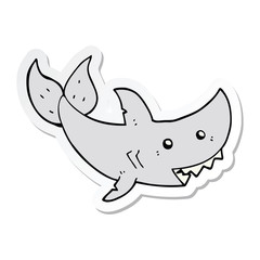 sticker of a cartoon shark