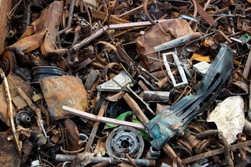 Scrap metal in railway cars.. Scrap yard, metal rubbish stock. 