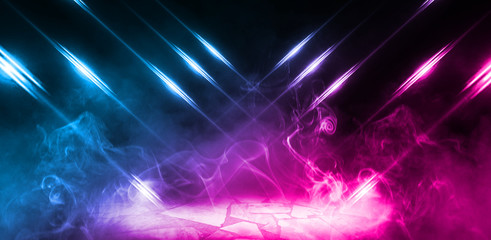 Dark empty stage, multicolored rays of neon searchlight, wet asphalt, smoke, night shooting, bokeh color.