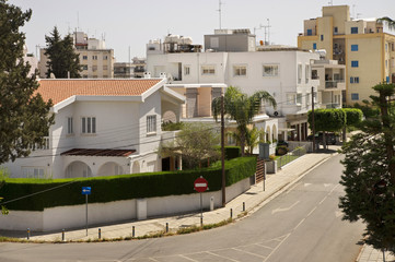 Fototapeta na wymiar Typical street in modern district of Nicosia. Cyprus