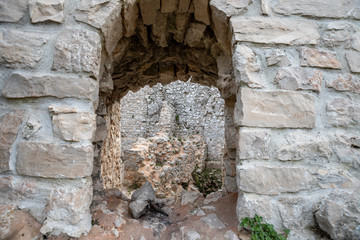 the ruins of Castel Pagano, built by the Normans, castle, church and necropoli built on the rocks. An archeological site in Gargano National Park, Apulia, Italy
