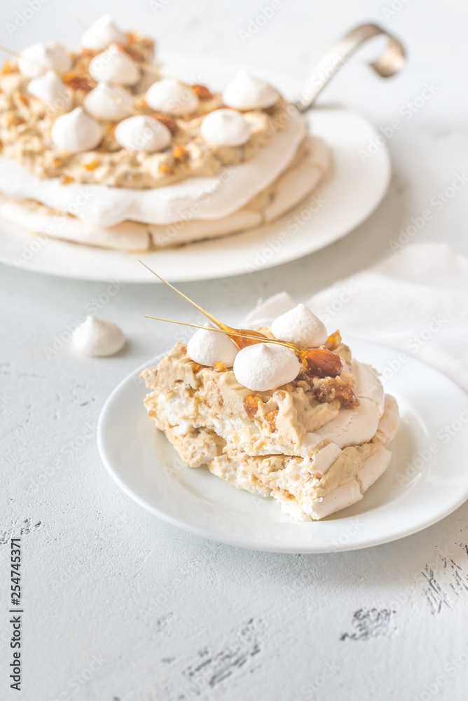 Sticker pavlova cake with caramel and almonds