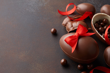 Easter composition with chocolate eggs and candies