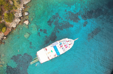The sea & a boat from aerial above