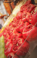 Pomegranates on a market stand