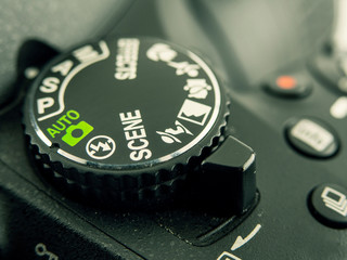 Close-up image of DSLR camera button dial