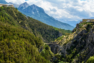 Ecrins mountains in Hautes Alpes Provence with Asfeld Bridge of Briancon, France