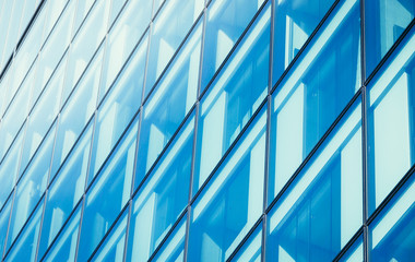 Blue skyscraper out of glass, modern office building