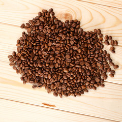 coffee beans on wooden background