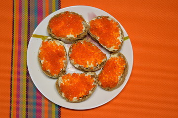 sandwich with red caviar fish caviar bread butter
