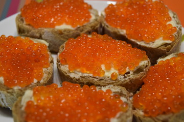 sandwich with red caviar fish caviar bread butter