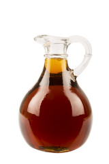 Decorative traditional maple syrup bottle from Canada. Isolated on white background.