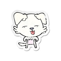 Obraz premium distressed sticker of a cartoon dog sticking out tongue