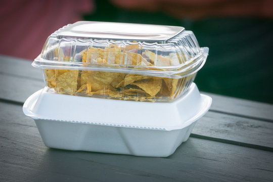 Single use plastic and Styrofoam food containers ready for take out from a restaurant. 