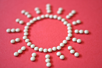 lined sun with rays from tablets and medications. The theme of health and saving lives. ?? ??????? ???? Stock Photography