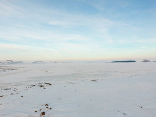 Fototapeta na wymiar Winter landscape,frozen lake on a clear winter day.