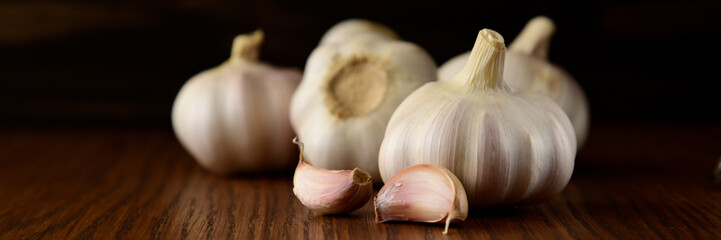 Garlic bulb on the wooden vintage background